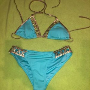 Victoria’s Secrets Aqua blue and gold bikini